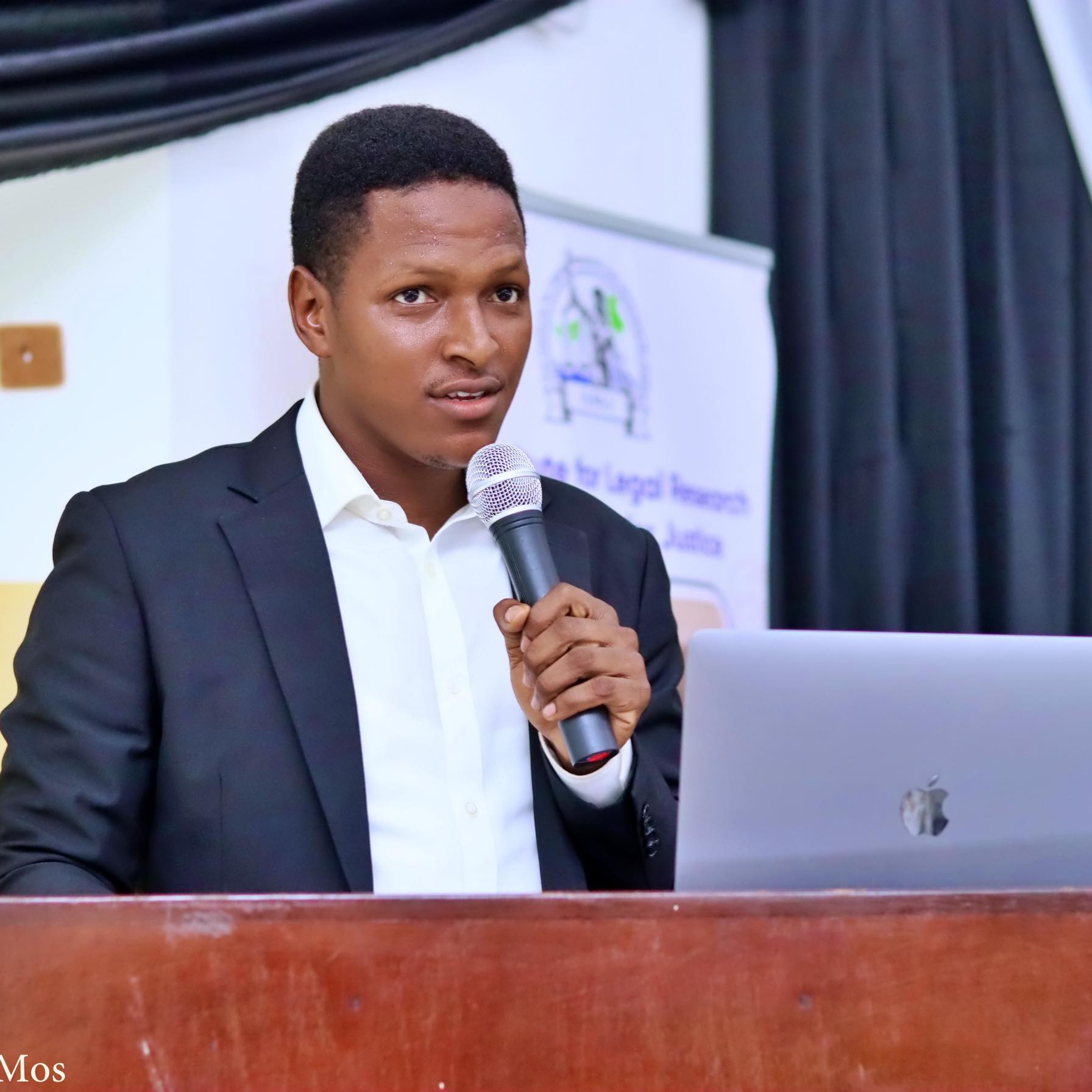 Mohamed Wurie Bah speaking at a legal conference